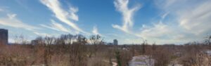 Far-reaching views over the rooftops of Munich from an apartment, Rogers Immobilien