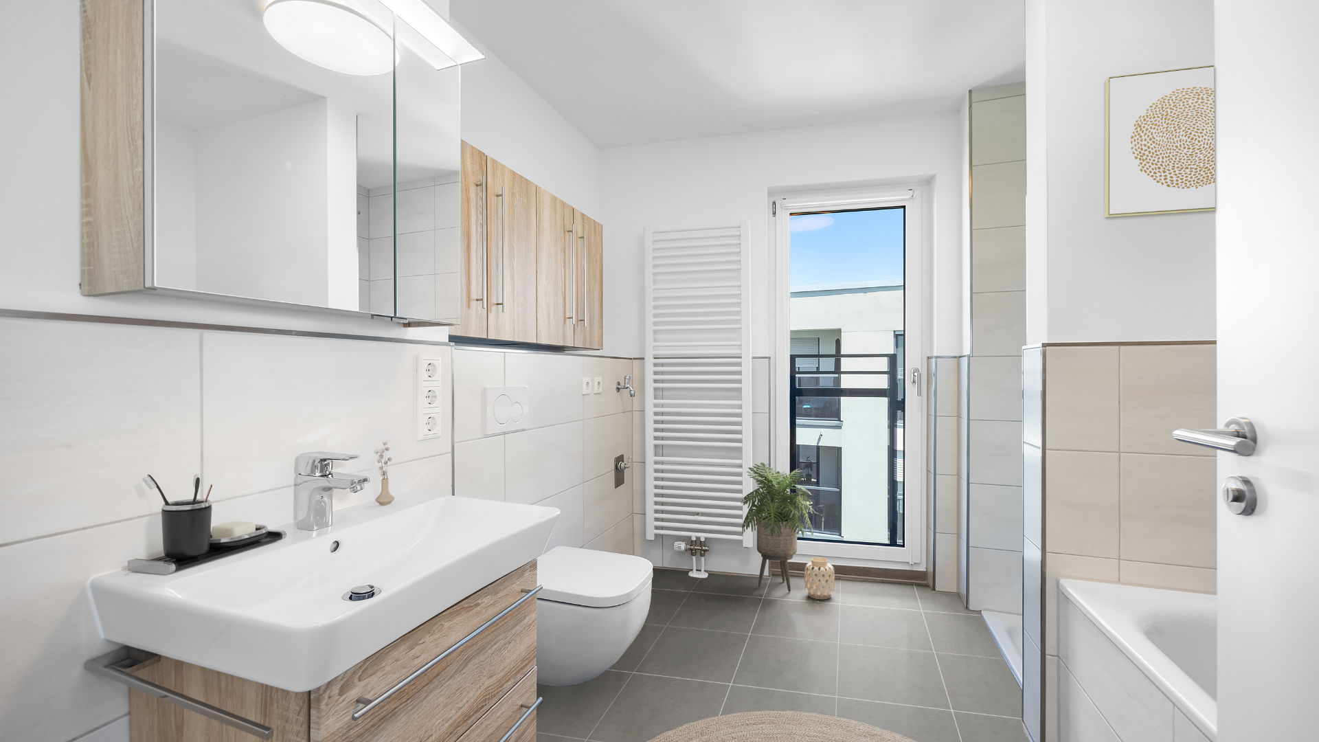 Digitally furnished bathroom of the new-build apartment in Aubing as virtual staging with a plant and wall decoration