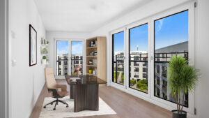 Digitally furnished study of the Aubing new-build apartment with desk and bookshelf as virtual staging