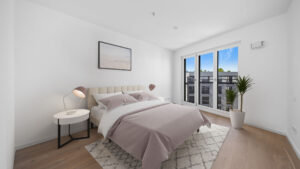 Virtually furnished bedroom of the new apartment in Aubing with a double bed and houseplant