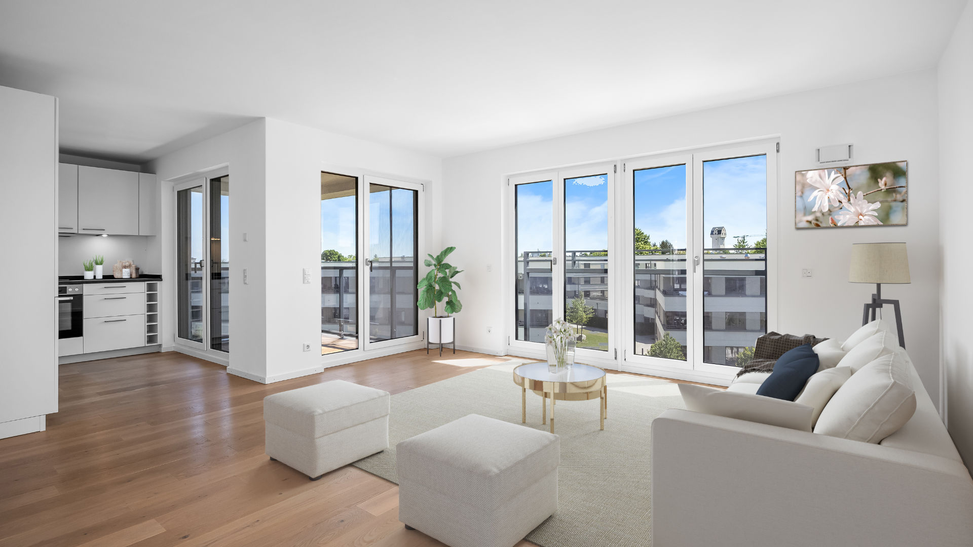 Virtually furnished living room of the new Aubinger apartment with a bright sofa and open kitchen