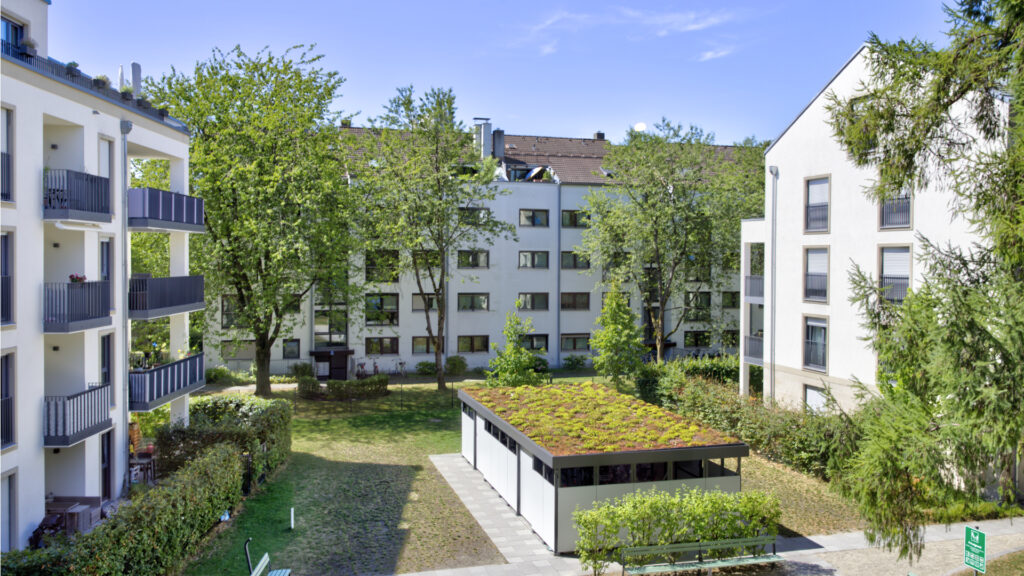 Top-down view of the green courtyard with residential buildings in Munich's Berg am Laim district