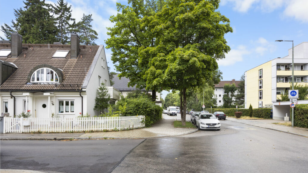 Street intersection with residential buildings in the vicinity of the Munich-Berg am Laim condominium