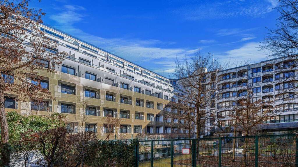 Facade view with brick and plaster surfaces of a residential building in Munich-Bogenhausen