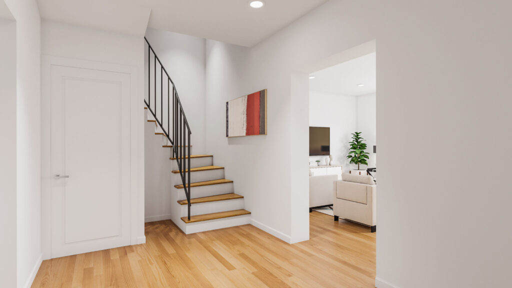 Eingangsdiele mit Treppe und Blick ins Wohnzimmer eines Hauses in Gauting
