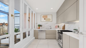Modern bright kitchen with marble backsplash, kitchen island, and window with city view in Munich-Haidhausen apartment