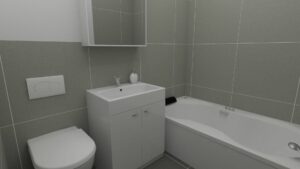 Virtual home staging of a bathroom with a sink, toilet, and bathtub in an apartment in Munich-Bogenhausen