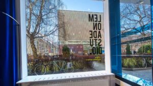 A view from a window of a modern museum building and bicycles in Munich's Maxvorstadt district