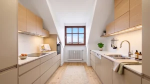 3D visualization of a modern, bright fitted kitchen under a sloping roof in Munich Berg am Laim – Rogers Immobilien