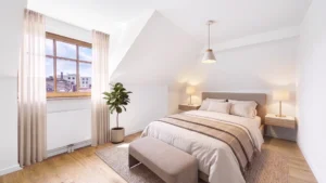 3D visualization of a bright bedroom with a double bed under the sloping roof in Munich Berg am Laim – Rogers Immobilien