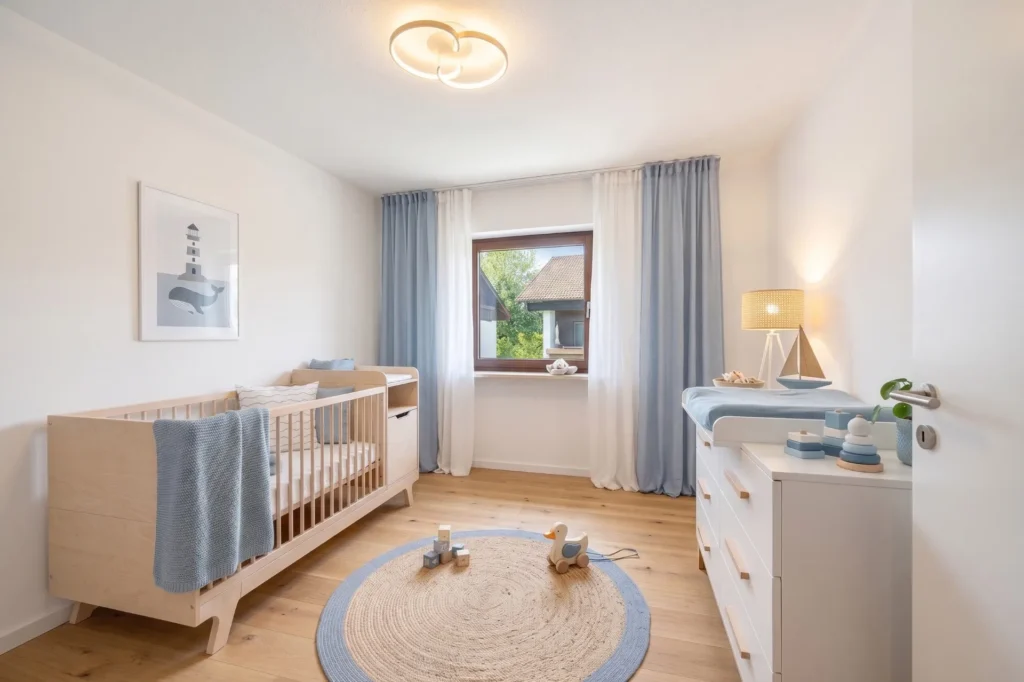 Virtually designed nursery with a crib and maritime decor