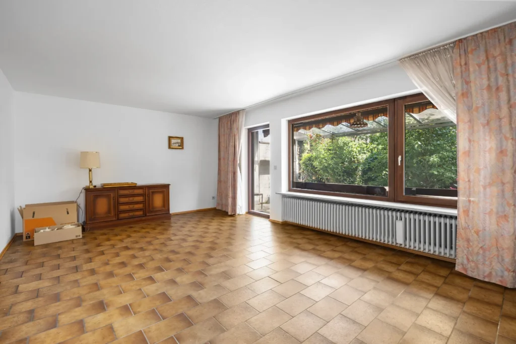 Spacious living room with terrace access, second perspective